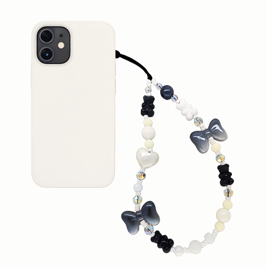 Monochrome Muse – Bow & Bead Phone Charm